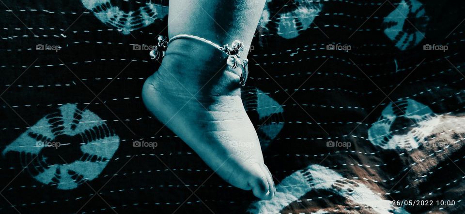 Baby's leg happy sleep