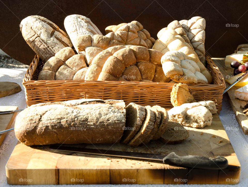 Various types of bread in a basket 