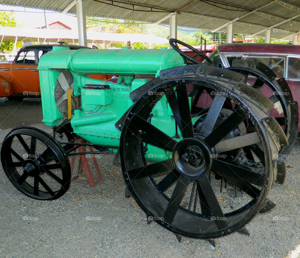 Antique tractors with steel wheels!
These iron best are a thing of the past. They are housed in an outdoor museum - Museo del Transporte,Santiago de Cuba!