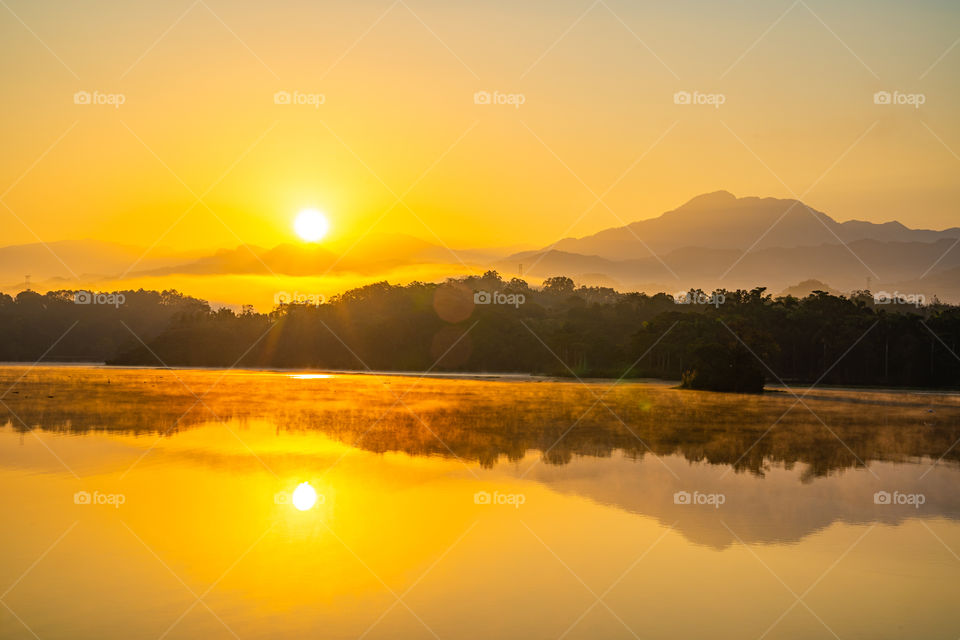 Mountain and sunlight reflection