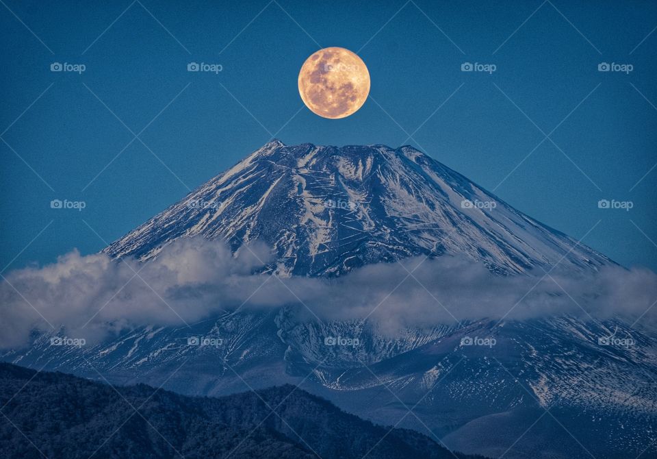 Fuji mountain on full moon background 