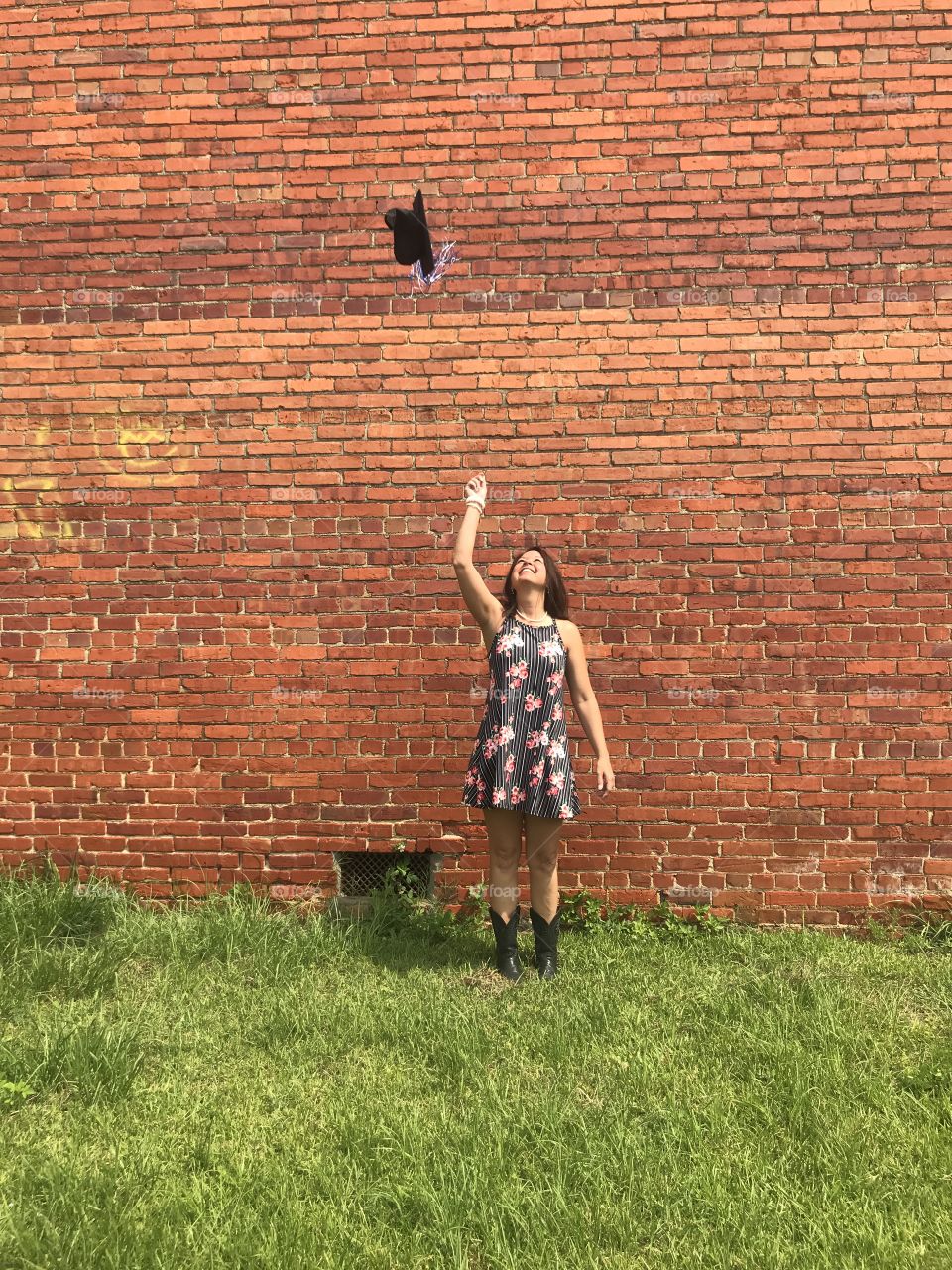 Tossing Graduation hat in air