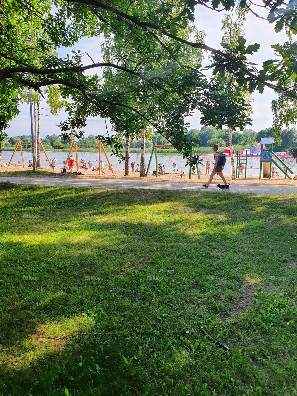 Hot summer day in the city center by the river.