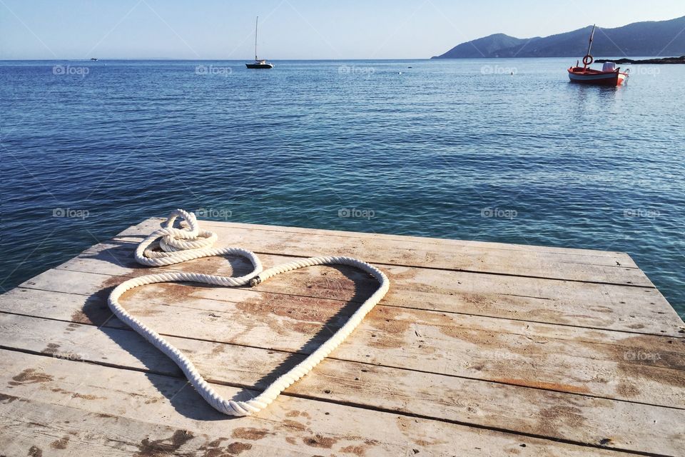 Heart shaped rope on a jetty