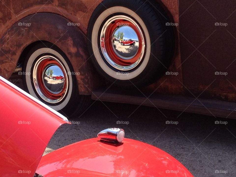 Reflections. 55 MGTF reflected in 30s rat rod hub caps