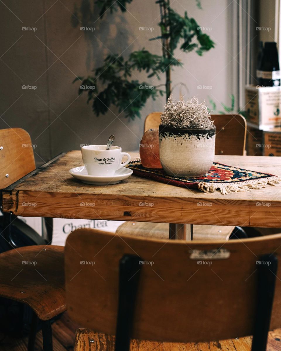 Coffee on the table in a cosy café