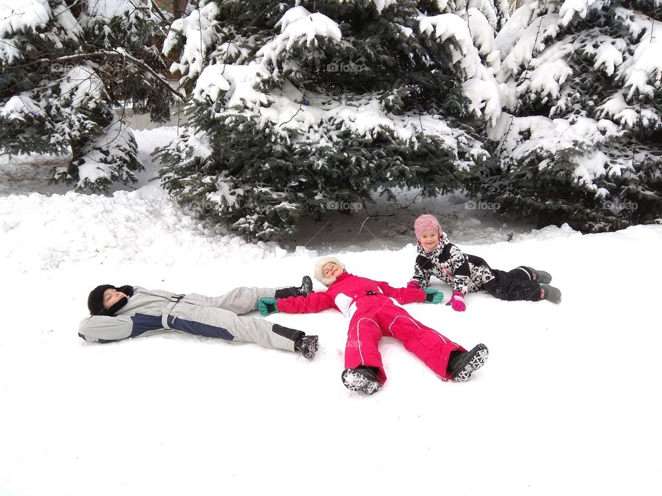 Kids having fun in the snow
