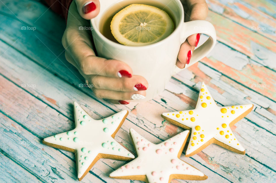 woman hand with cup of tea