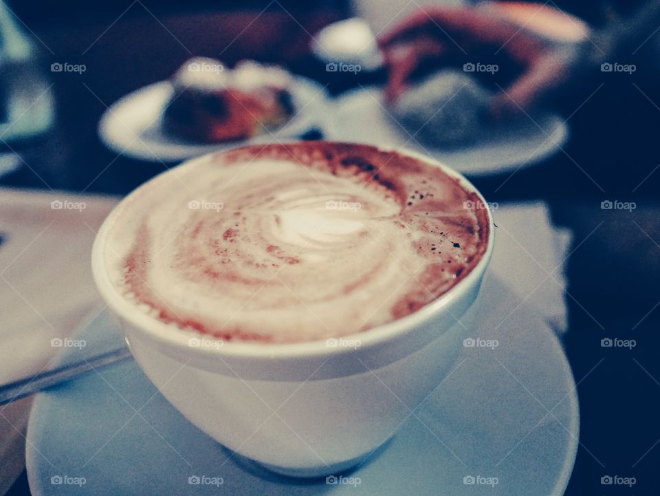 Cappuccino close up in a cafe