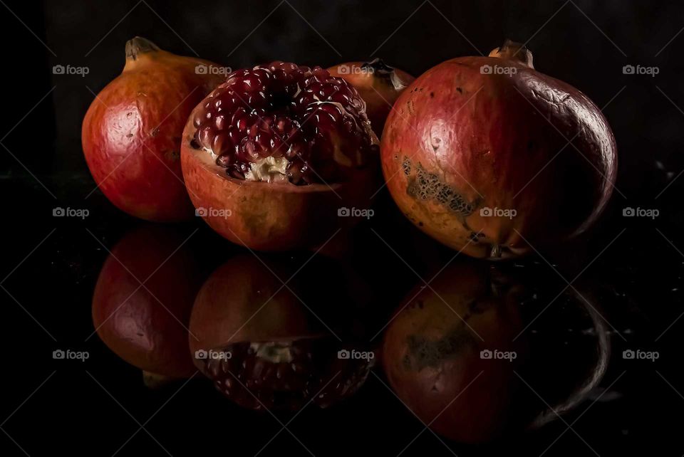 Pomegranate. Red colour effect & rule of odds