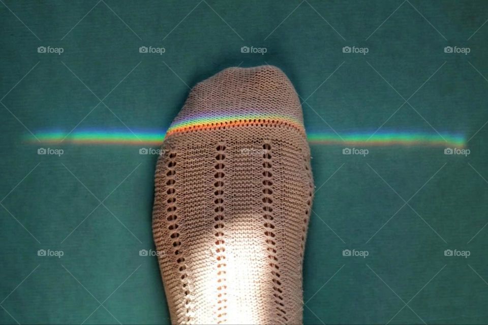 Refraction of light on a white stocking in rainbow colors