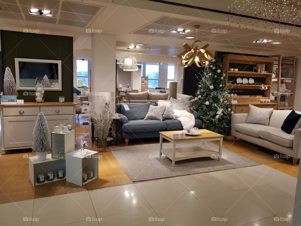 Interior design living area with rugs and sofas at Peter Jones Sloane square Chelsea King's road London
