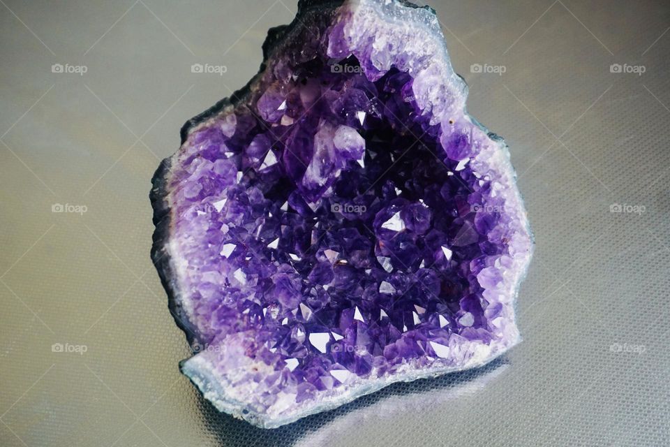 Amethyst is a purple variety  of quartz, a semiprecious stone, often used in jewelry  and is the traditional birthstone  of February. 