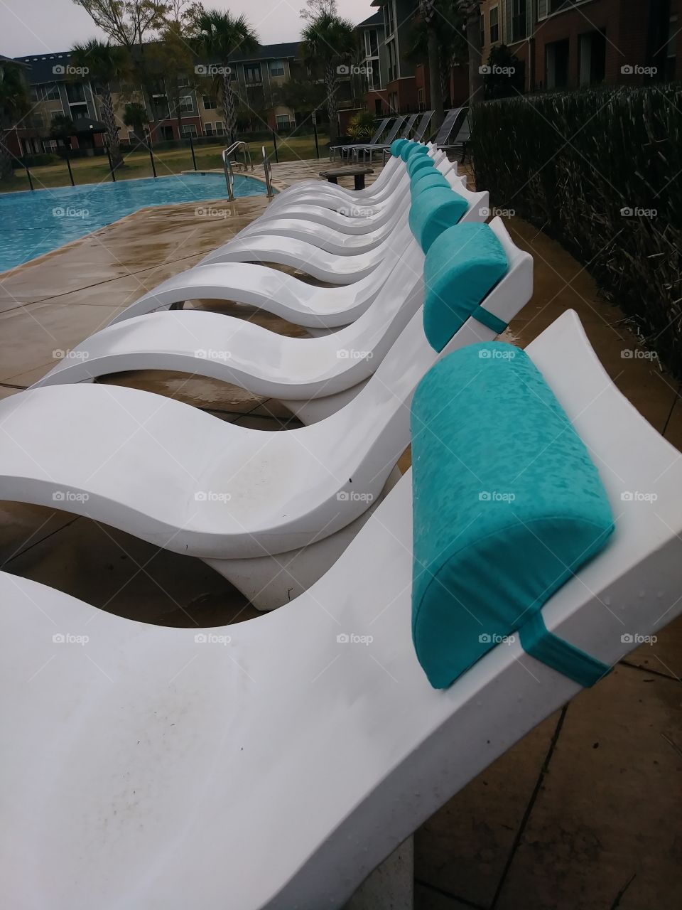 rainy chairs by the pool