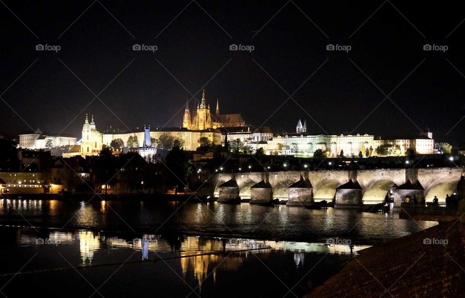 Prague Castle and reflection at night