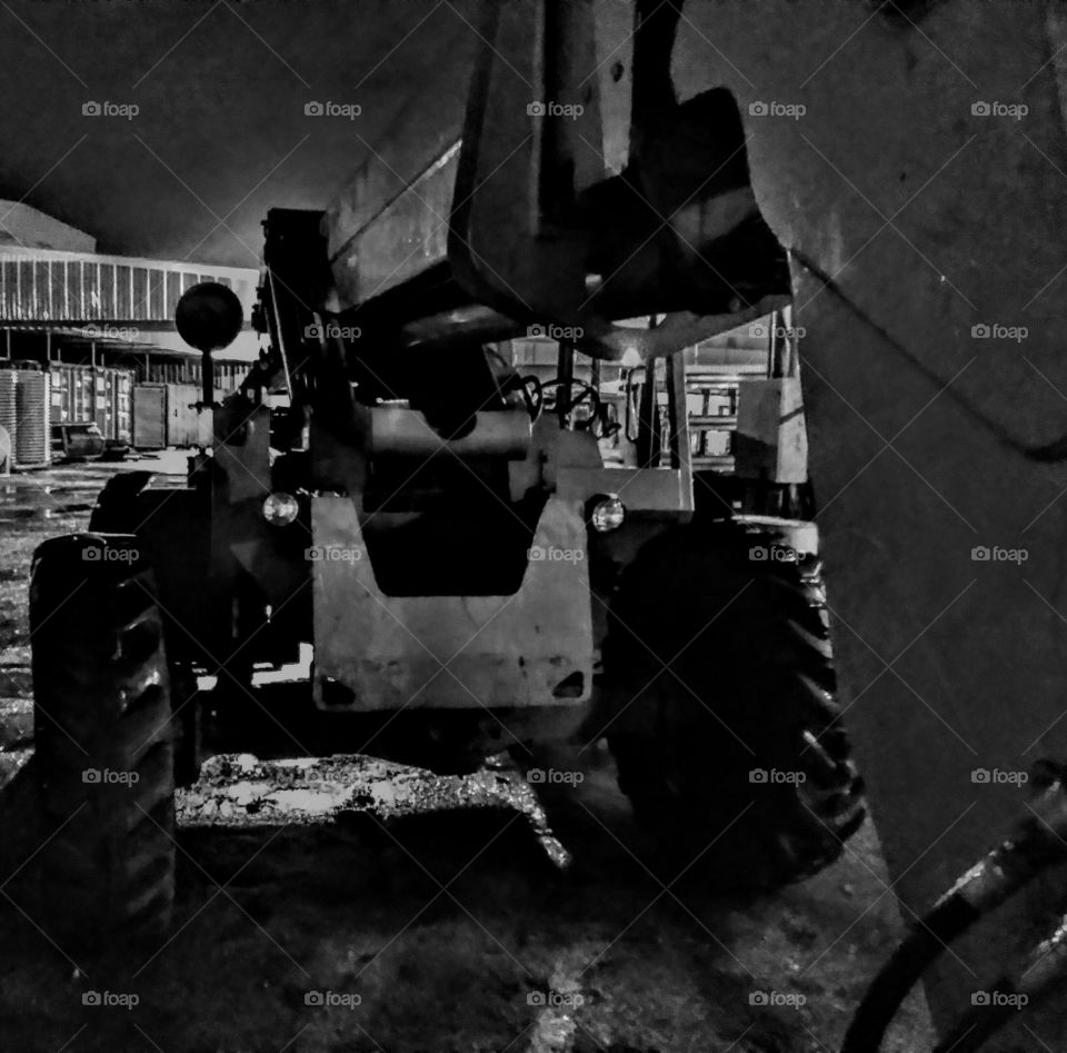 night shot of parked bulldozer