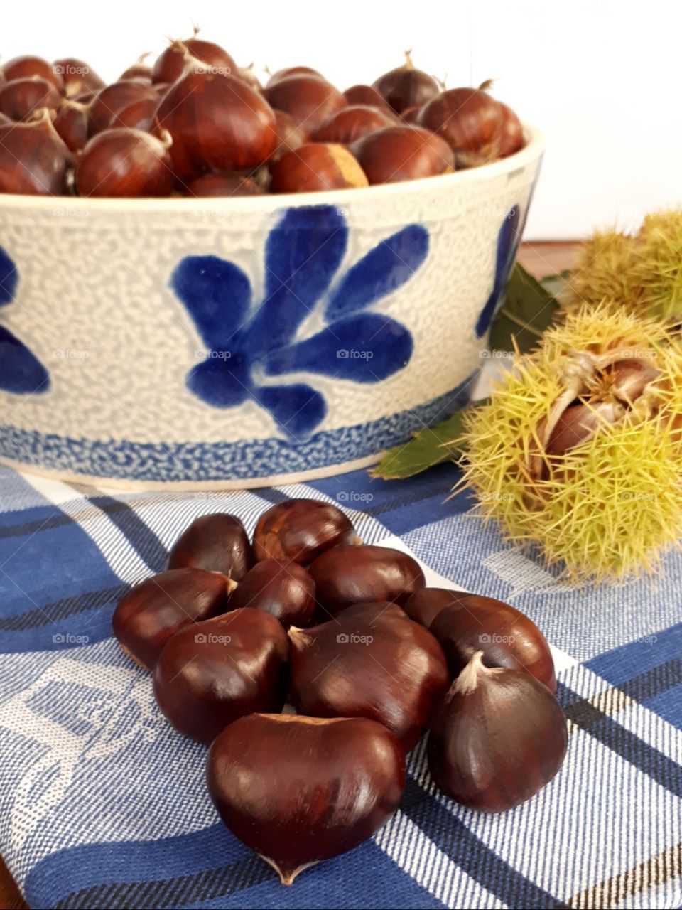chestnuts on a blue and white towel