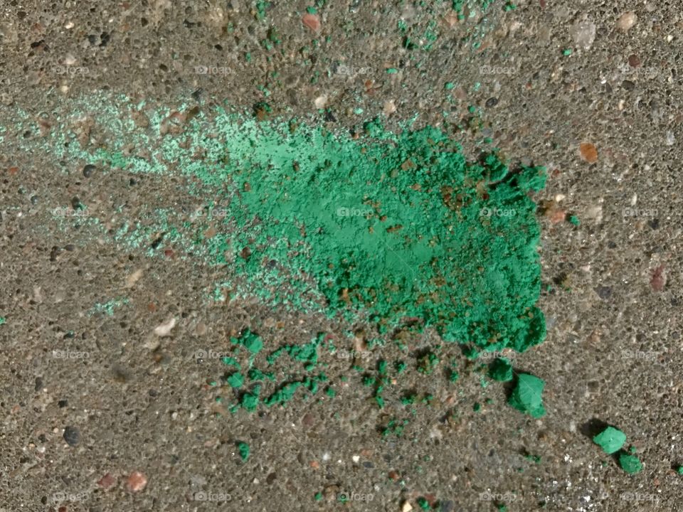 Green painting on asphalt 