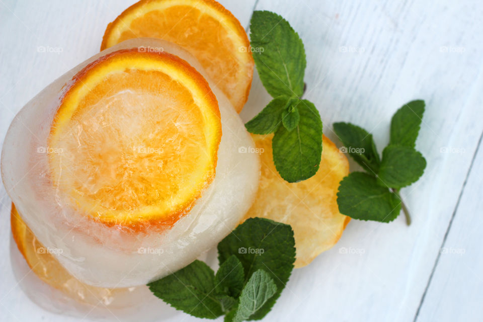 Orange slices and mint leaf