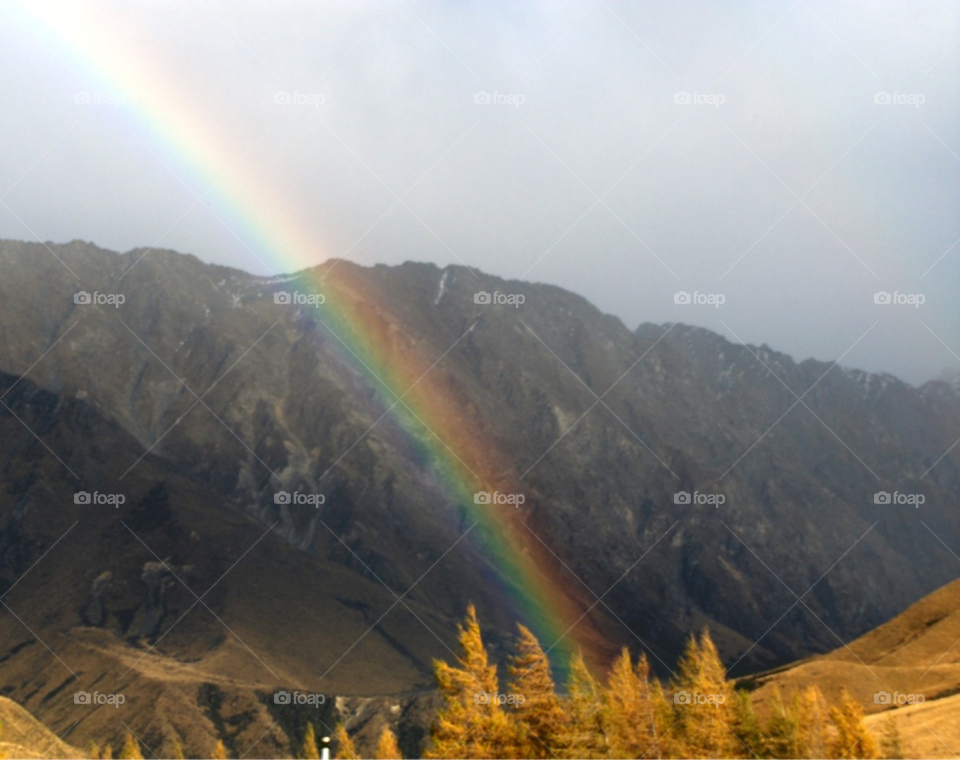 new zealand rainbow mountains hillside by Amy