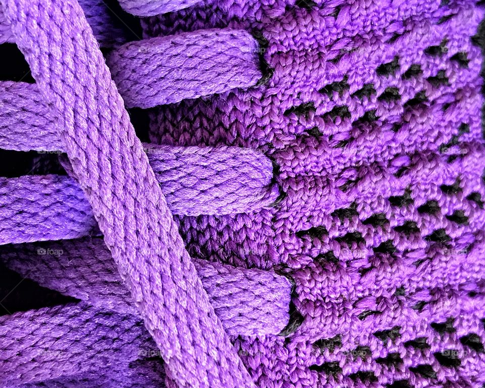 Close up of purple shoe lace