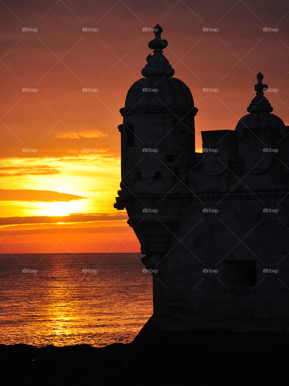 Silhouette at sunset by the ocean