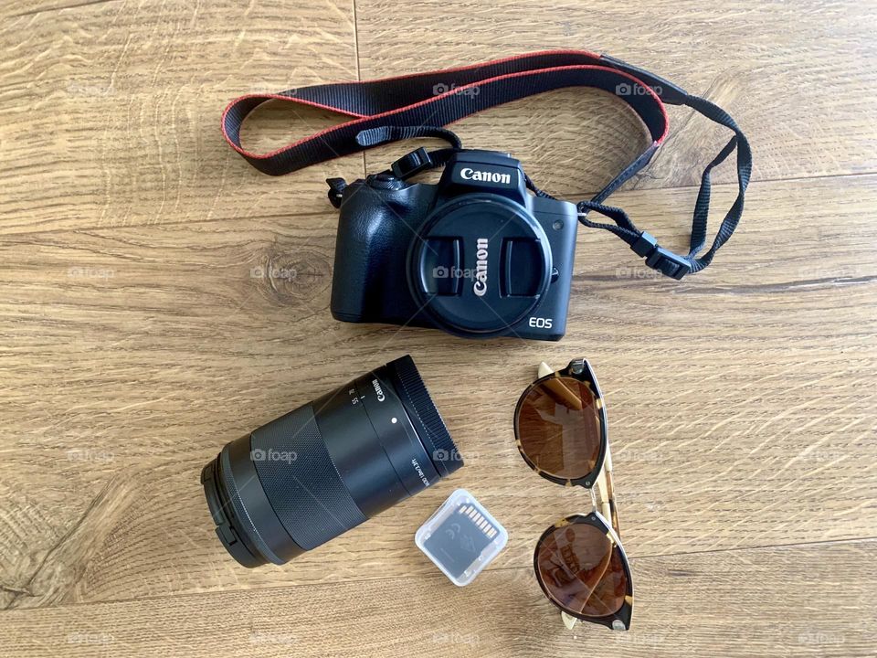 Canon camera lens memory card sunglasses 