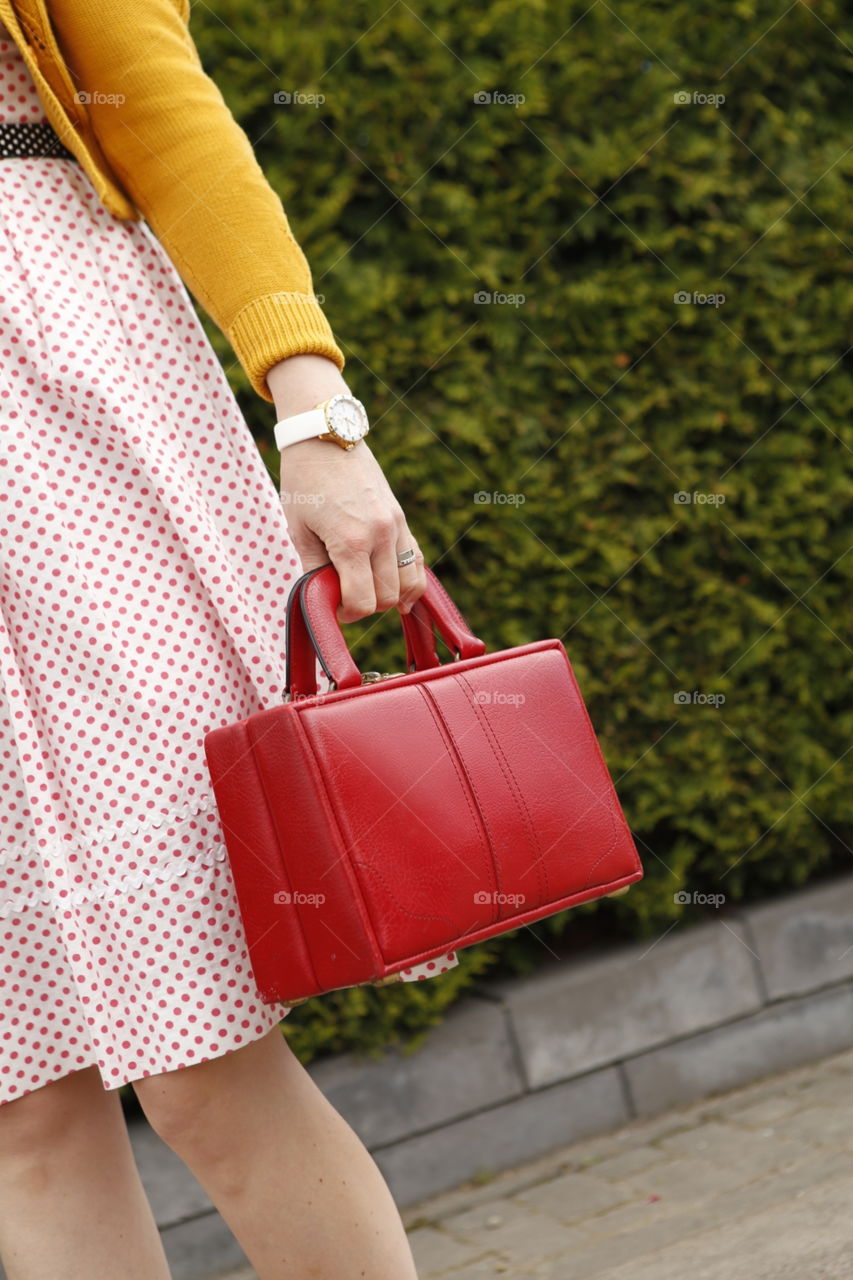 Vintage fashion with red bag and polka dots
