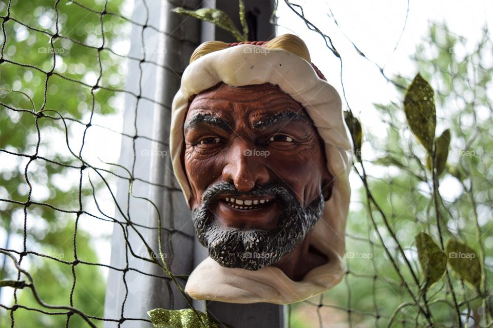 ceramic Arab man with moustache and beard wall mask close up