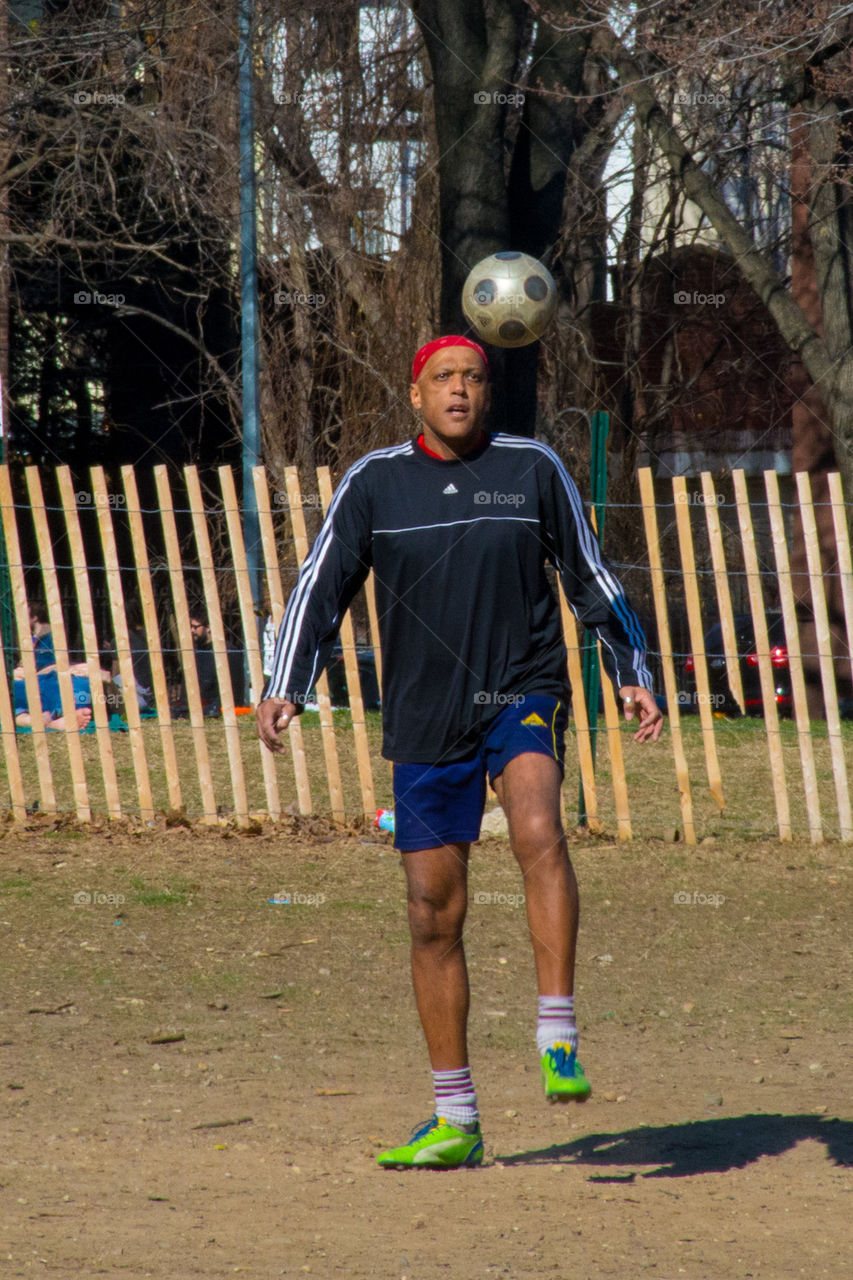 man playing football