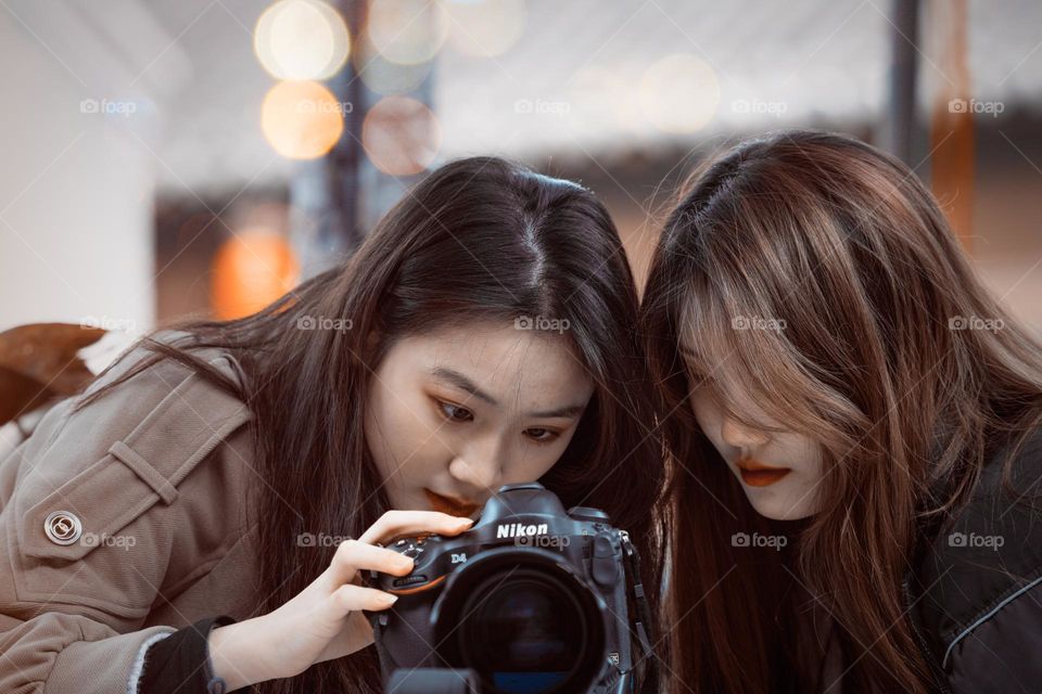 Girls operating the camera