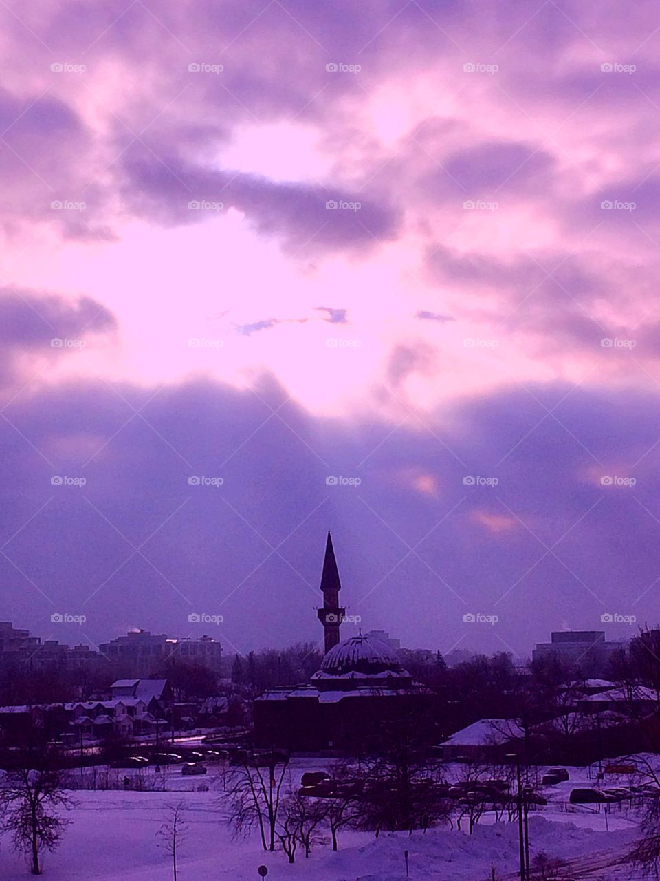 Scenic view of winter landscape against purple sky