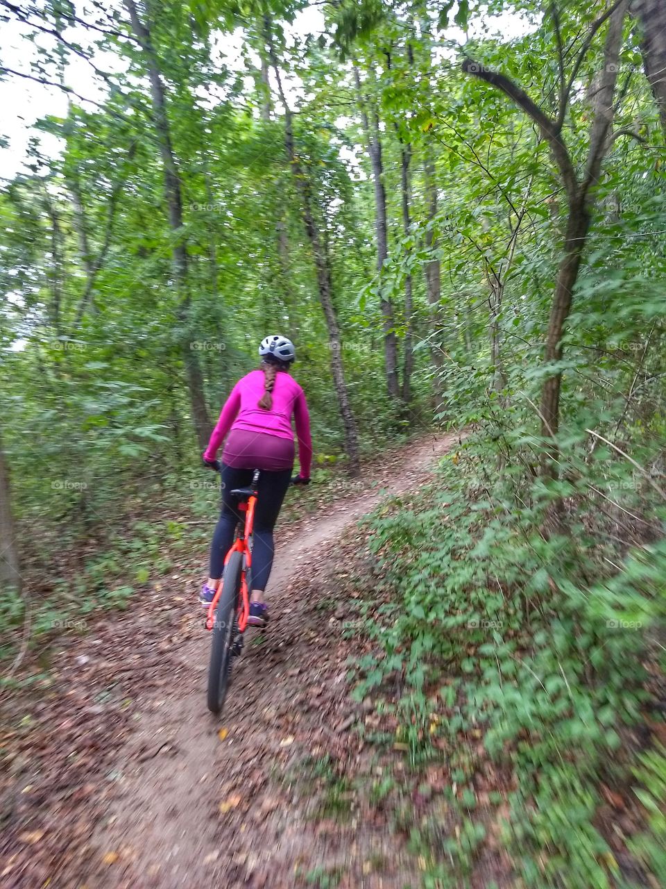 standing curve female cyclist
