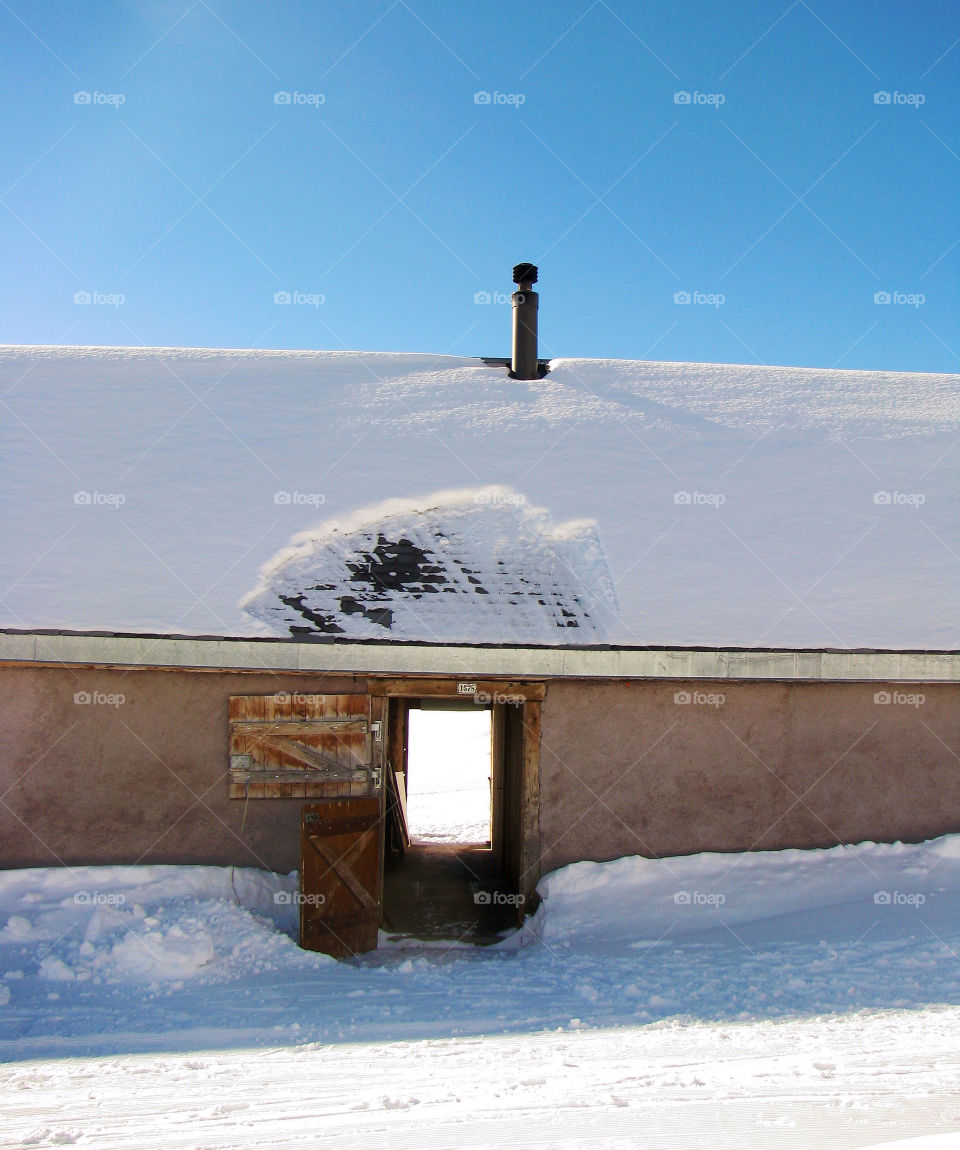 Farm in the snow on the mountain