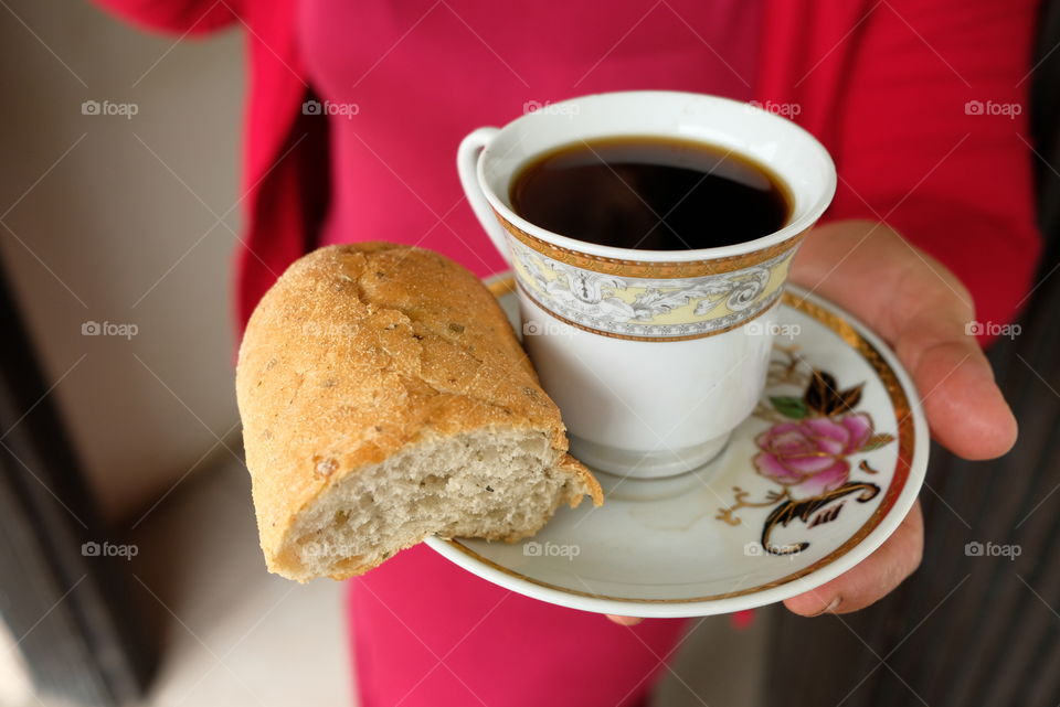 Coffee with bread as a welcome to a house