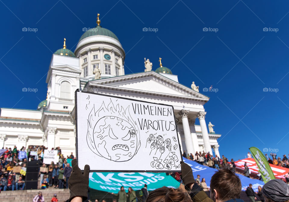 Helsinki, Finland - April 6, 2019: March and demonstration against climate change (Ilmastomarssi) in downtown Helsinki, Finland attended by more than 10000 people. 