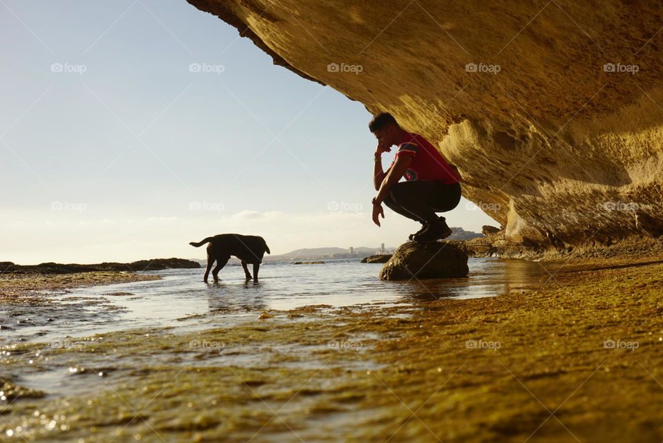 Sea#rocks#sky#nature#human#dog