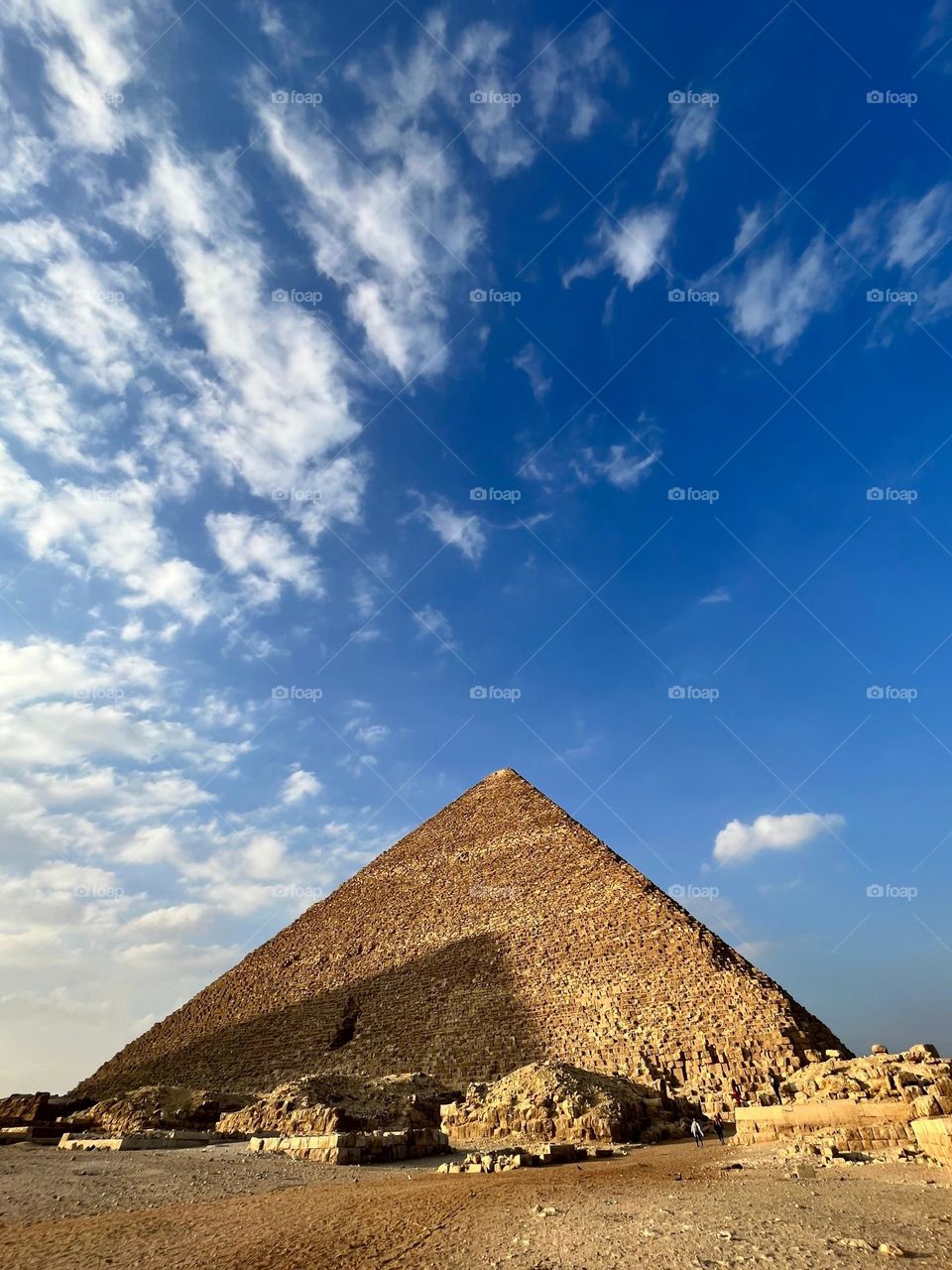 Step pyramid under the blue sky with some clouds at Cairo Egypt