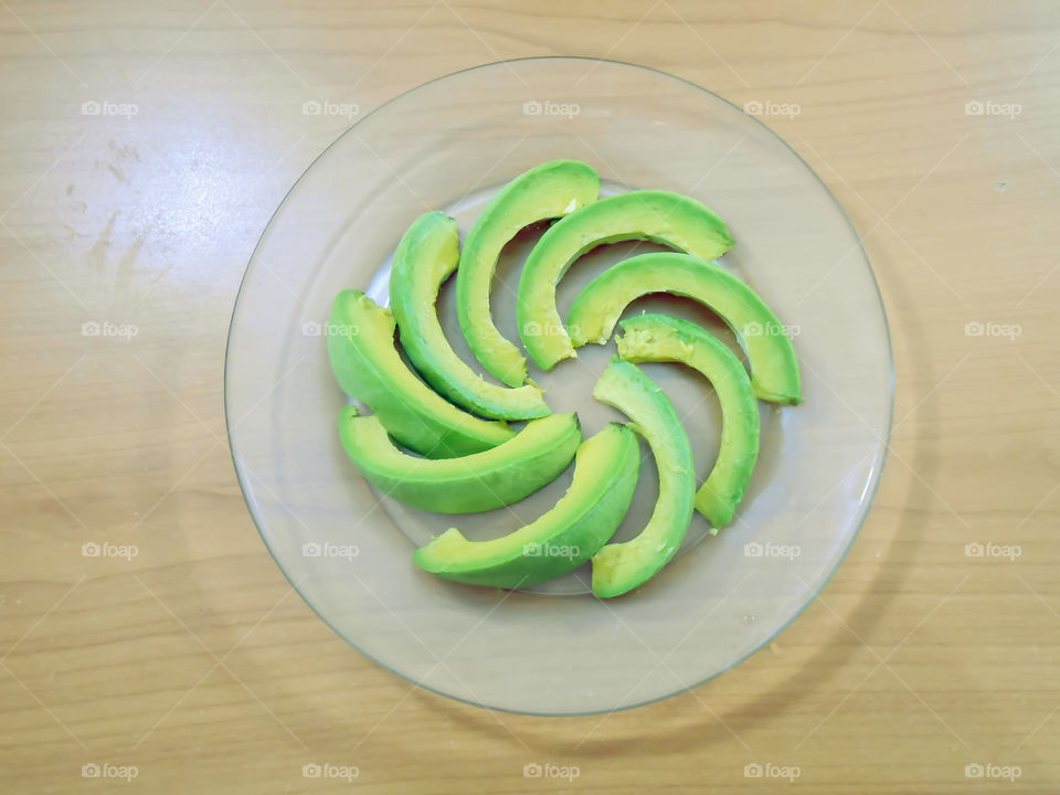 Avocado Slices In Clear Transparent Plate