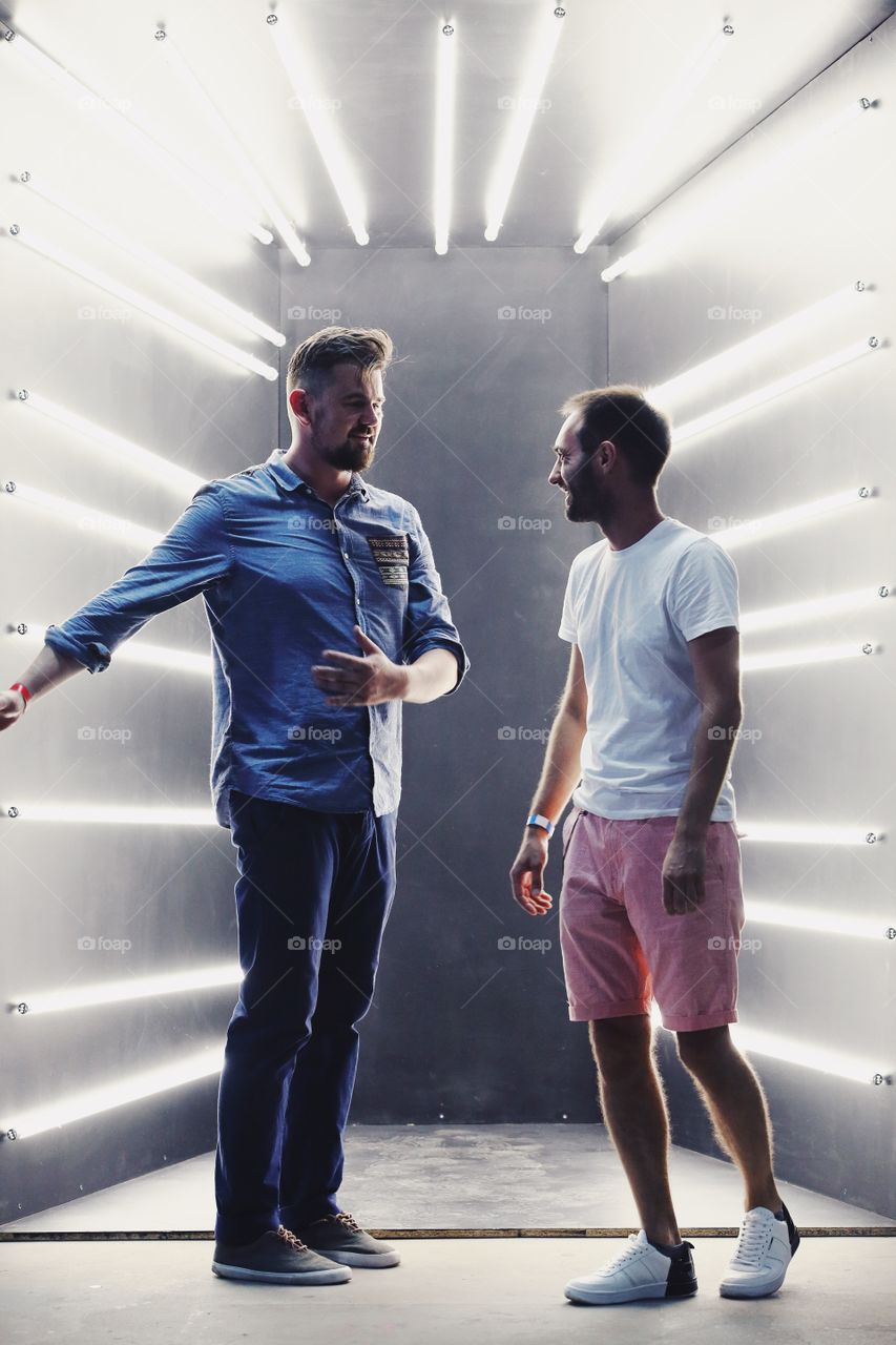 two men in a conversation