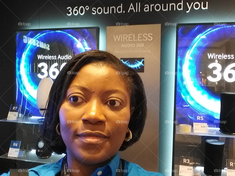 Samsung wireless audio 360 smart speakers in the background with bluetooth and wifi streaming