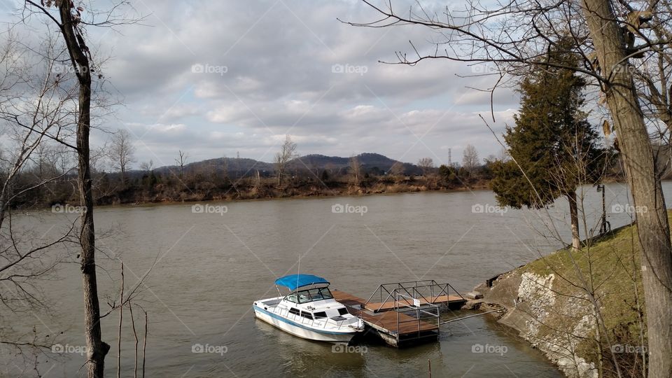 Boat and dock on river
