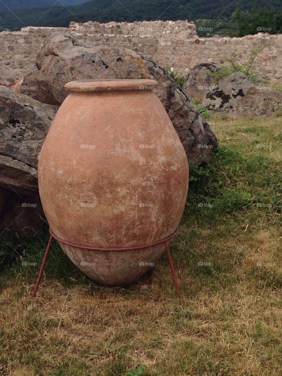 Clay jar and artifacts in Peristera fortress  in Bulgaria - Ancient and Medieval archaeological monument in Peshtera, Bulgaria.
