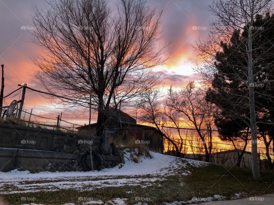 Sunset over barn in Wyoming 