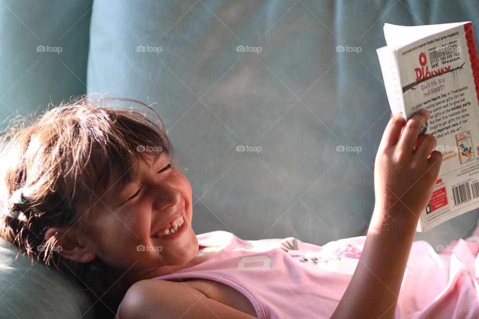 Portrait of a happy laughing cute girl