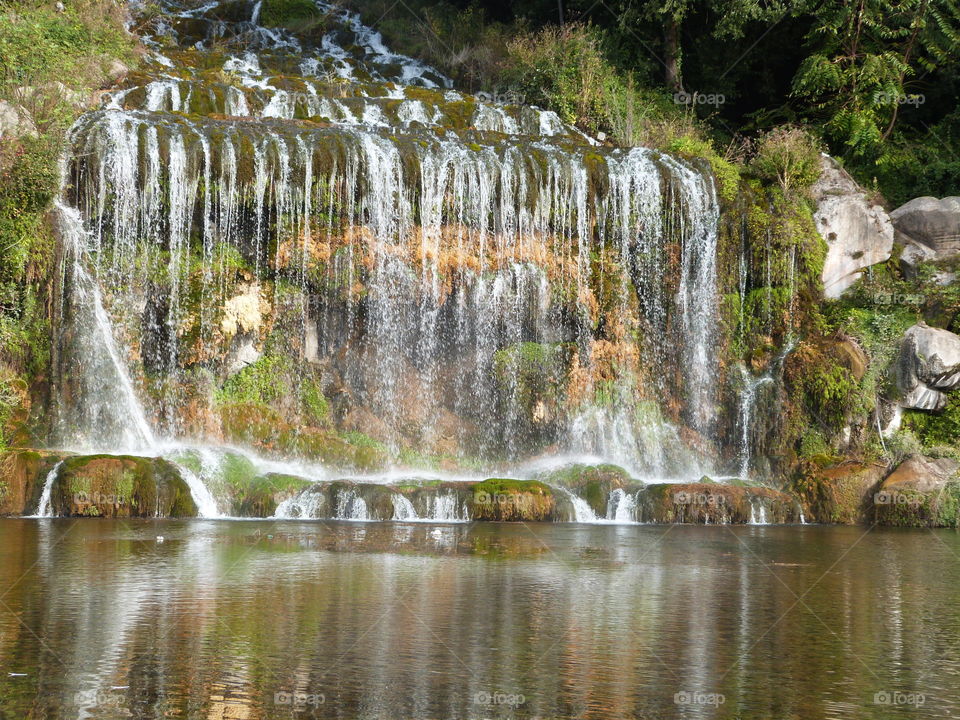 Water mirror with waterfall