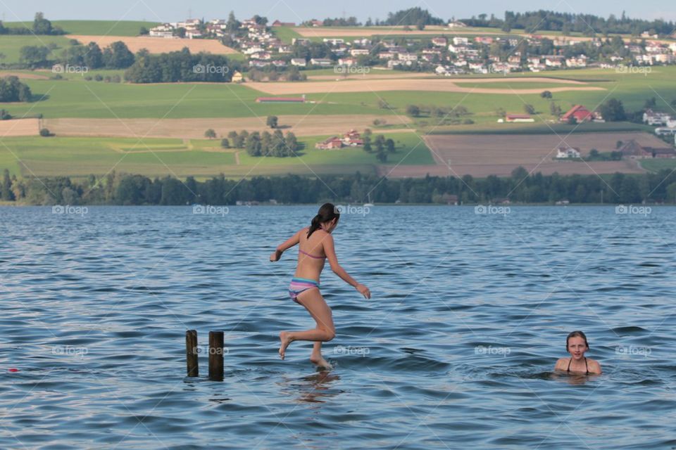 Girls Having Fun In Water