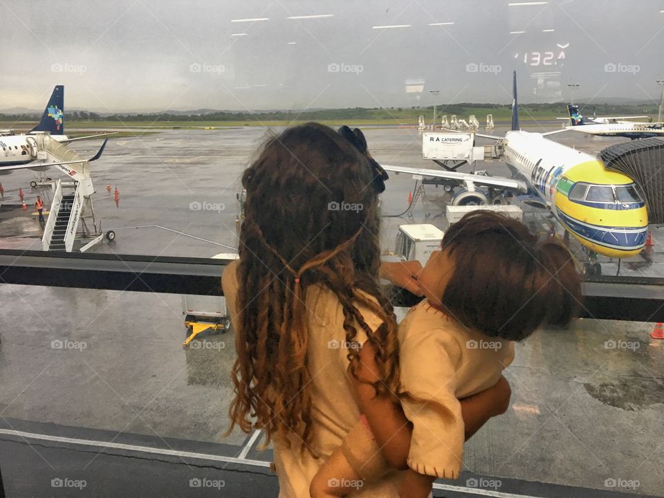 Little girl waiting to board the plane