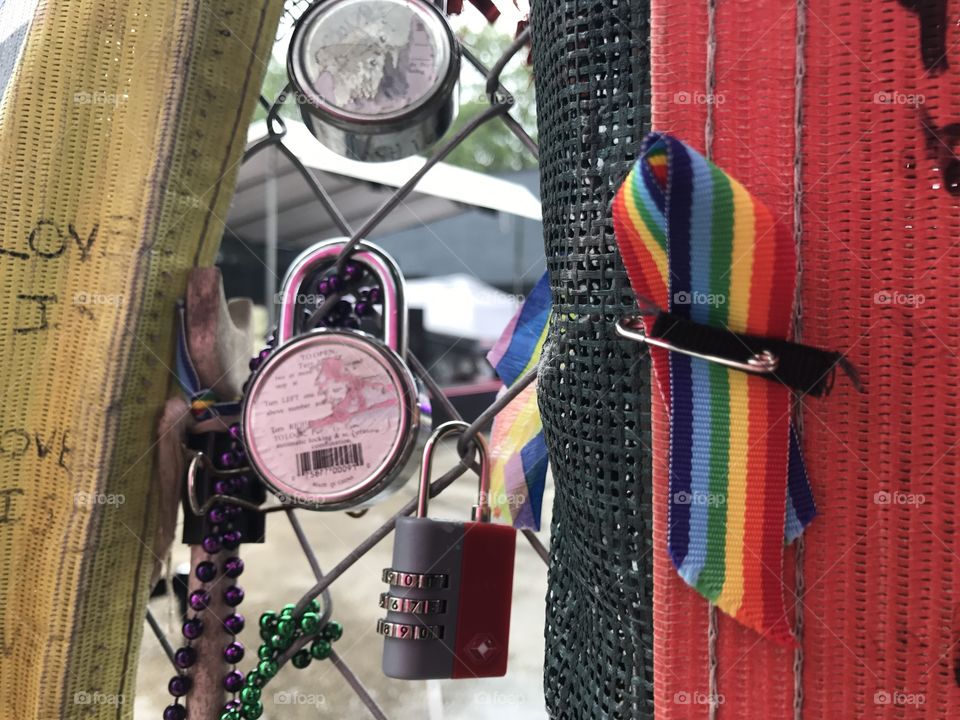 Love locks on the fence surrounding the Pulse Nightclub in Orlando Florida 
