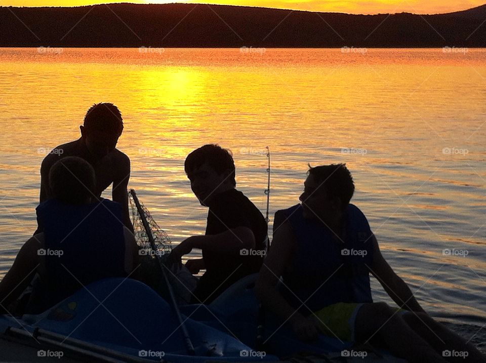 Sunset Lake fishing. Silhouette lake fishing